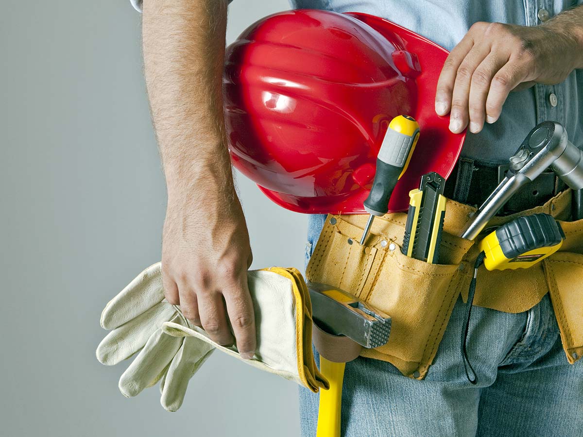 A technician with a tool belt.
