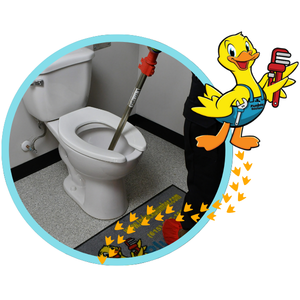 commercial plumber working in the bathroom