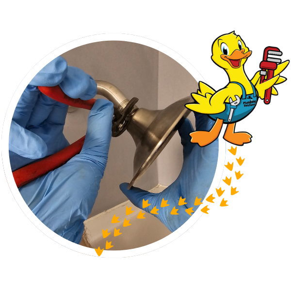 plumber fixing a shower head